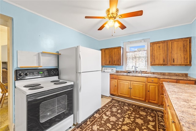 kitchen with white appliances, crown molding, sink, ceiling fan, and washer / clothes dryer