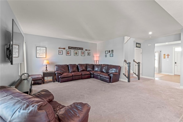 living room with light colored carpet