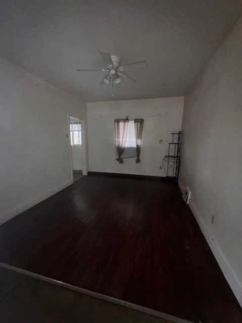 unfurnished room featuring wood-type flooring and ceiling fan