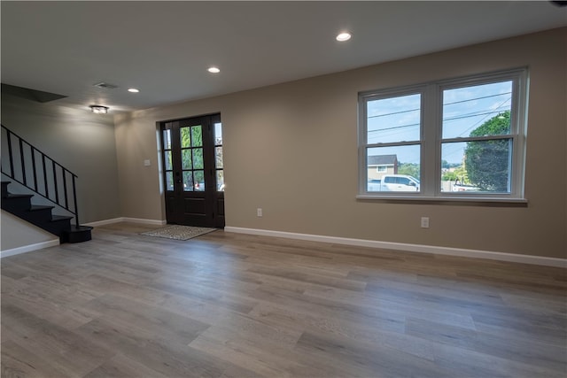 foyer entrance featuring light wood-type flooring