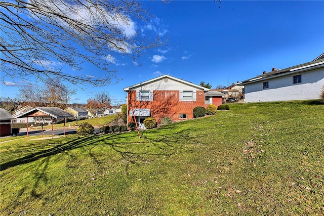 rear view of property featuring a yard