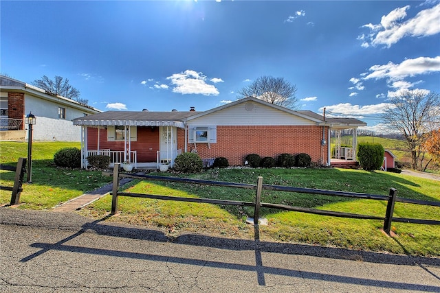 ranch-style house with a front lawn