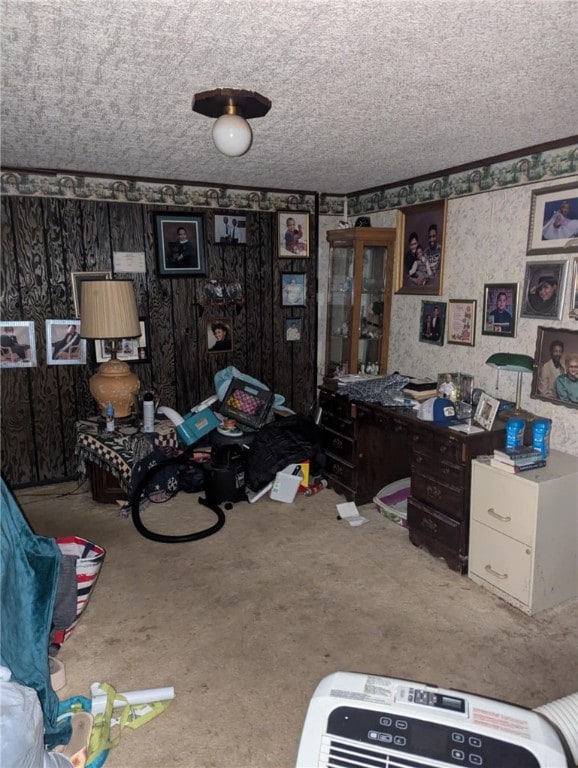 carpeted bedroom featuring a textured ceiling