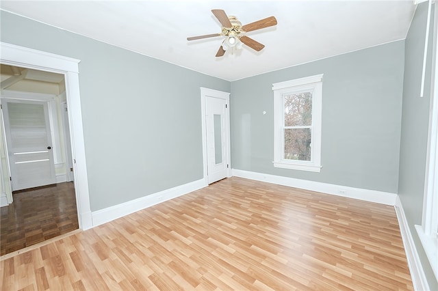 unfurnished room with ceiling fan and light hardwood / wood-style floors