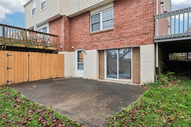 back of property featuring a patio area