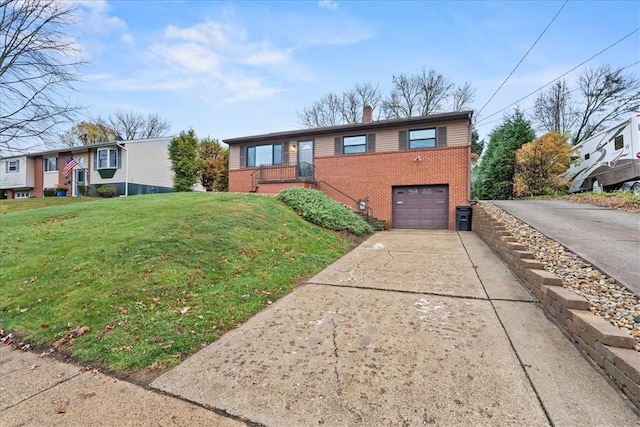 view of front of house with a garage and a front yard