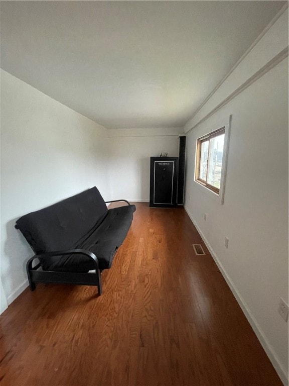 living area featuring hardwood / wood-style floors