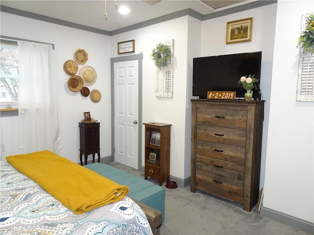 carpeted bedroom featuring ornamental molding