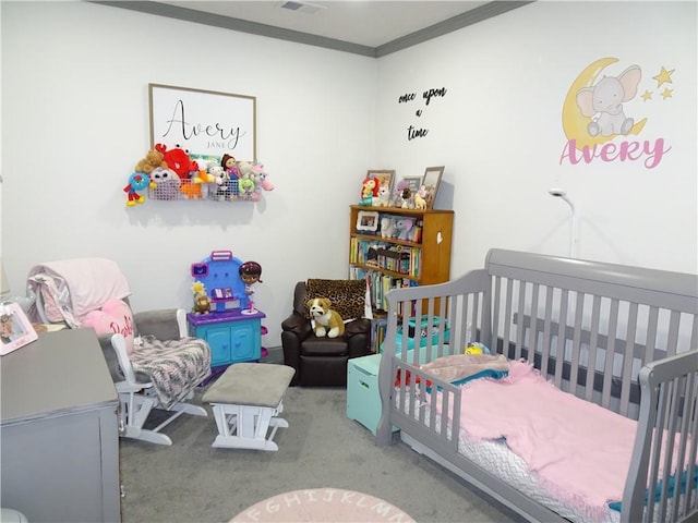 bedroom featuring light carpet, a crib, and ornamental molding