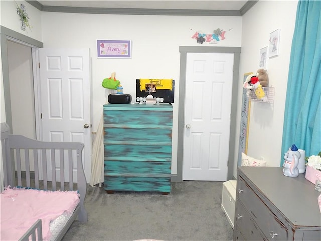 carpeted bedroom featuring crown molding