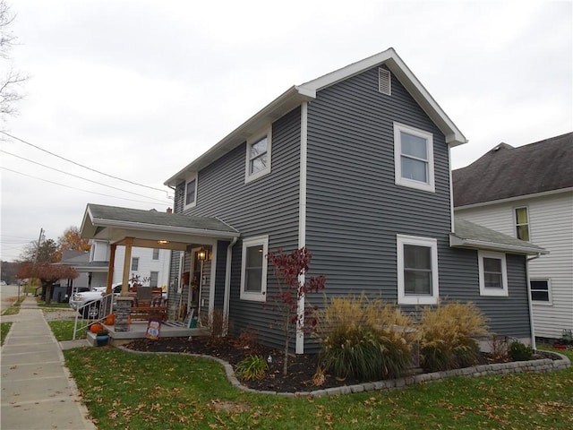 view of property exterior featuring a yard