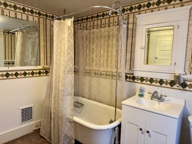 full bathroom featuring shower / bath combination with curtain, vanity, toilet, and tile walls