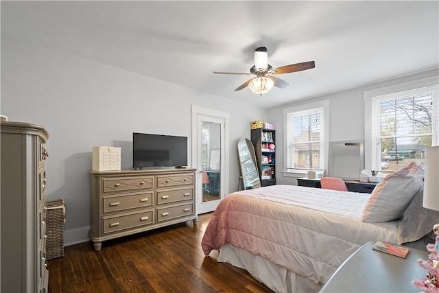 bedroom featuring ceiling fan and dark hardwood / wood-style flooring