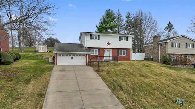 view of front of property with a storage unit and a front yard