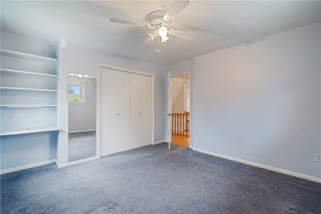 unfurnished bedroom featuring carpet flooring, a closet, and ceiling fan