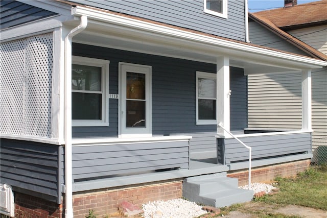 view of home's exterior featuring a porch