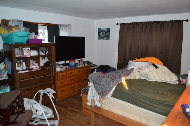 bedroom featuring hardwood / wood-style floors