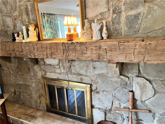 interior details featuring a fireplace