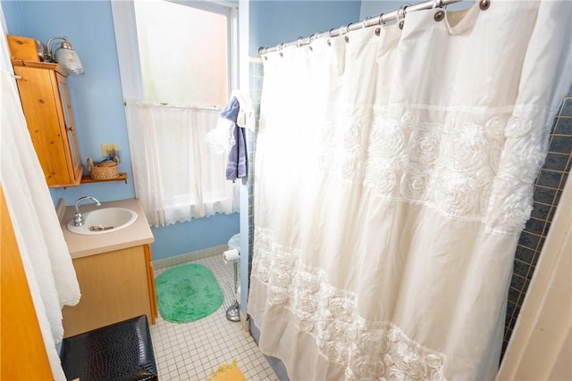 bathroom with vanity and tile patterned flooring