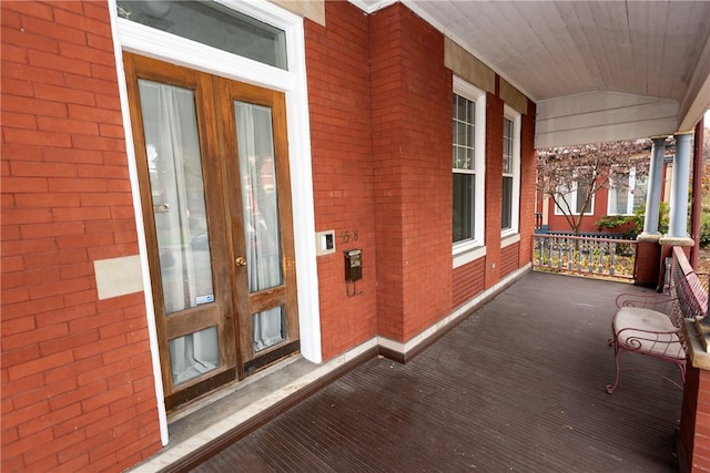 doorway to property with covered porch