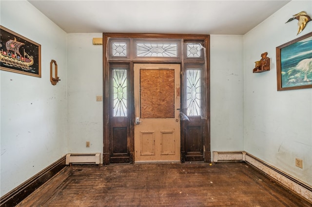 entryway featuring dark hardwood / wood-style flooring and a baseboard heating unit