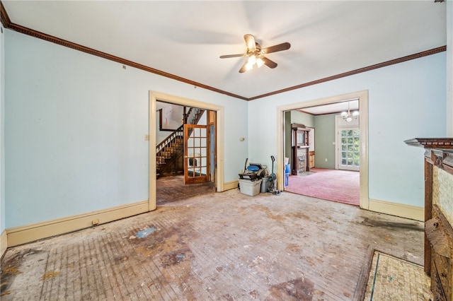 interior space with crown molding and ceiling fan with notable chandelier