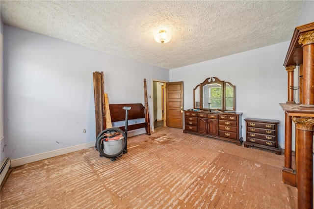 bedroom featuring a textured ceiling