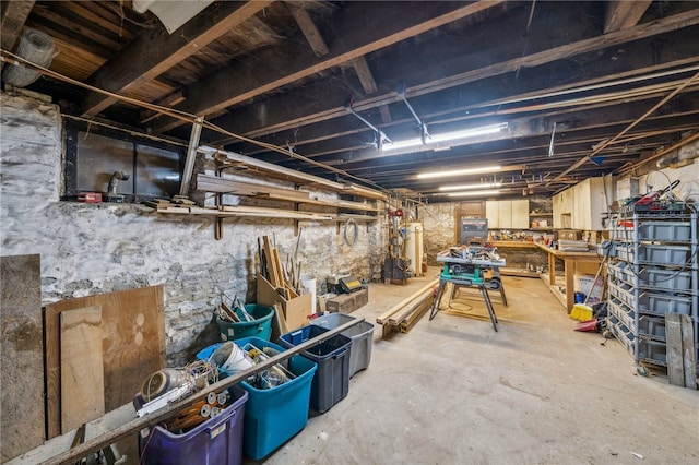 basement featuring water heater