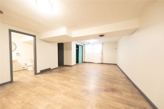 empty room with light wood-type flooring