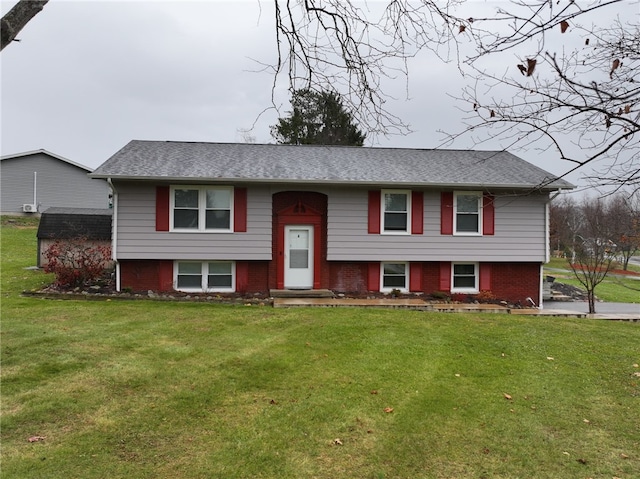 bi-level home with a front yard