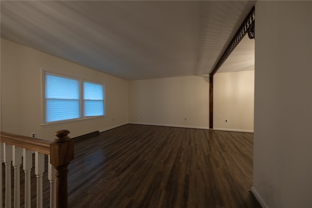 bonus room featuring dark hardwood / wood-style floors