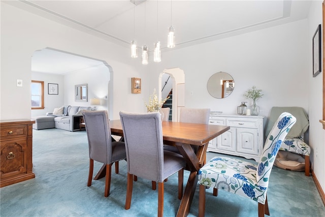 view of carpeted dining space