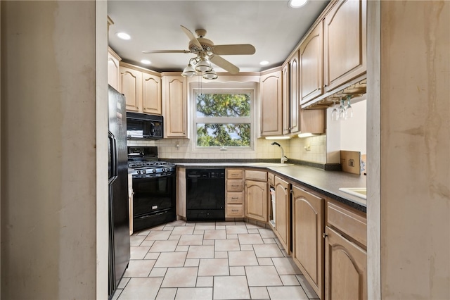 kitchen with black appliances, backsplash, light brown cabinets, and sink