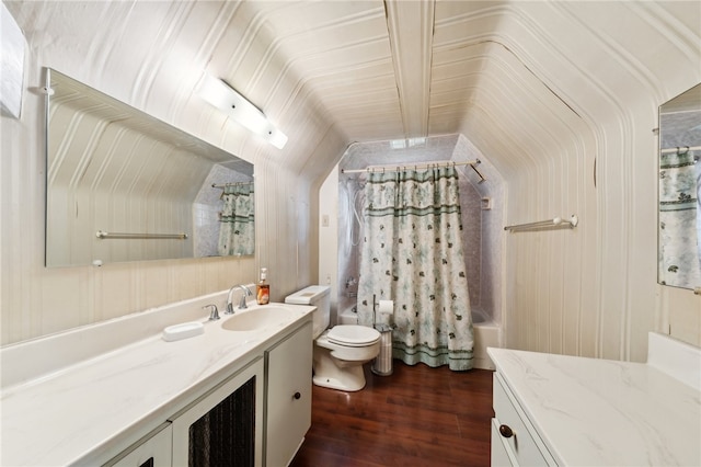 full bathroom featuring shower / bath combo, vanity, lofted ceiling, toilet, and wood-type flooring