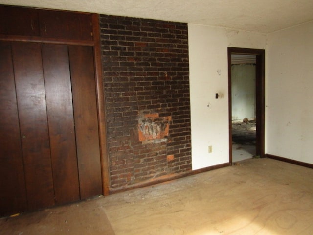 unfurnished bedroom with a closet