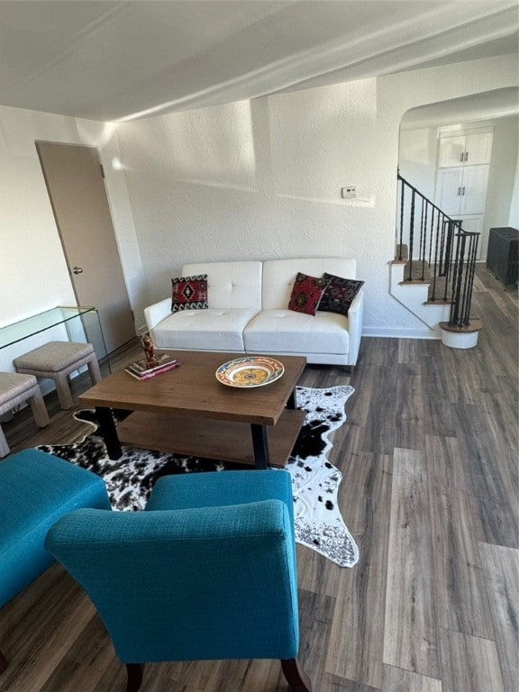 living room featuring dark hardwood / wood-style floors