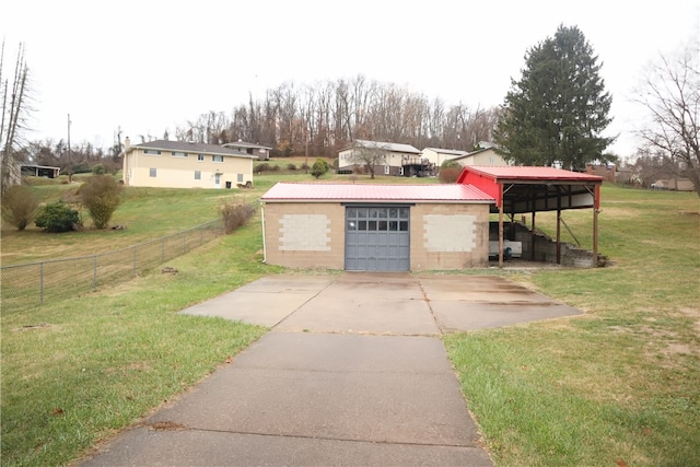 view of yard with an outbuilding and a garage