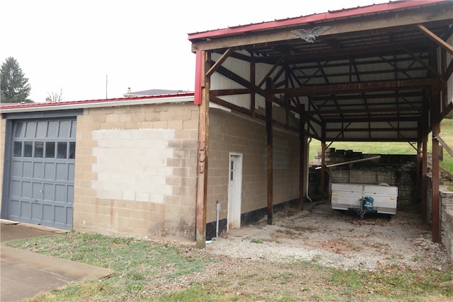 view of side of property with a carport