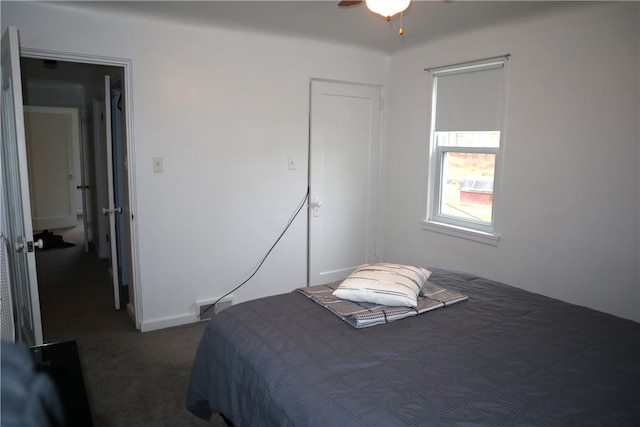 carpeted bedroom featuring ceiling fan