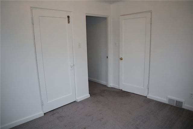 unfurnished bedroom with carpet