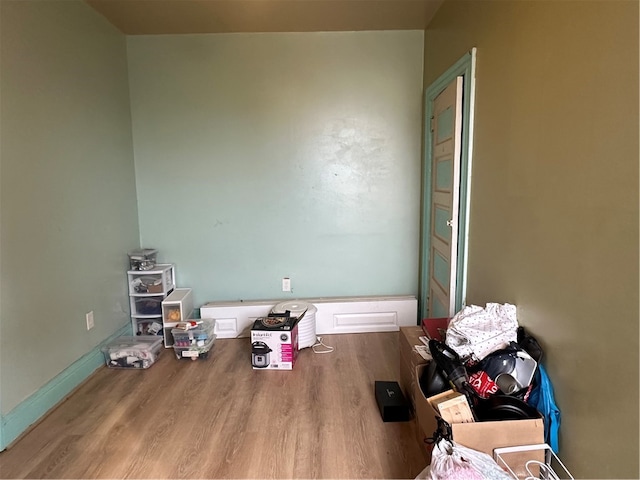 empty room with wood-type flooring