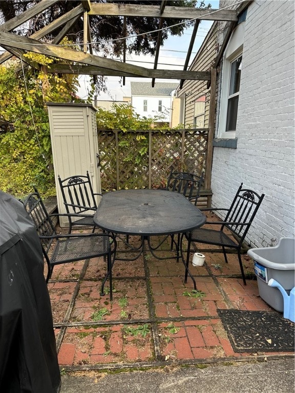 view of patio with a grill