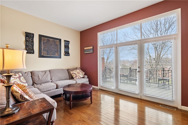 living room with hardwood / wood-style floors