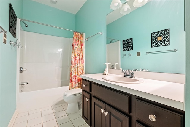 full bathroom featuring tile patterned flooring, shower / bath combo, toilet, and vanity