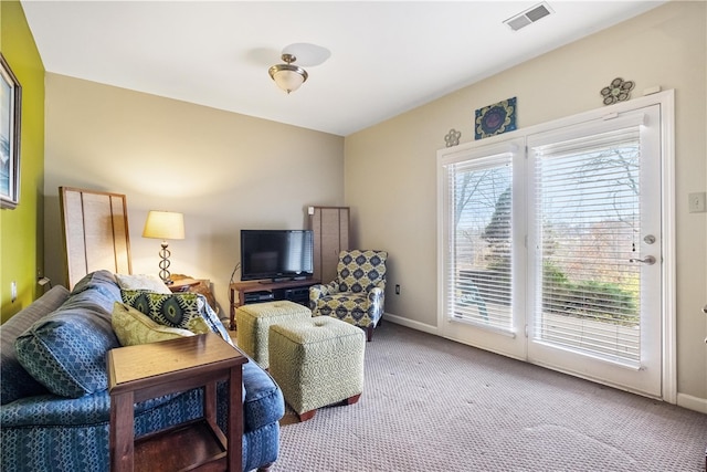 living room featuring carpet