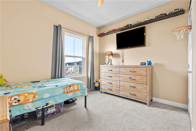 bedroom featuring ceiling fan and carpet floors