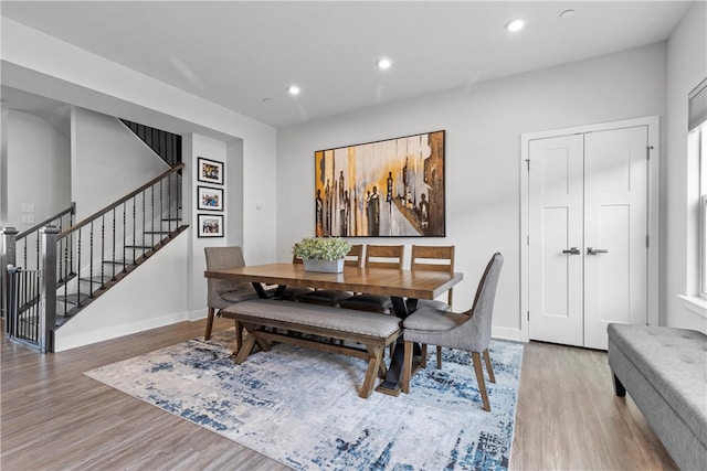 dining room with hardwood / wood-style floors