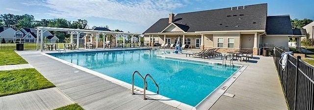 view of swimming pool featuring a patio