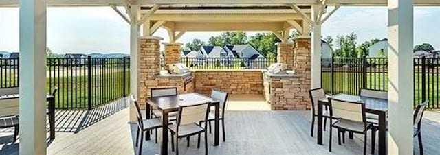 view of patio / terrace featuring exterior kitchen