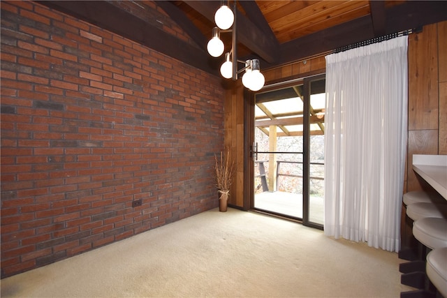 interior space featuring light carpet, ceiling fan, and brick wall